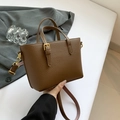Brown litchi leather bucket bag with gold buckle and adjustable shoulder strap - Light Brown Single Bag
