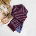 Sciarpa in maglia a pois bordeaux e azzurro con motivo geometrico a strisce - OV Rosso Vino Geometrico