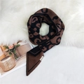 Knitted leopard print scarf with soft brown texture and white brand woven label - 150cm / Brown Leopard