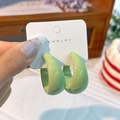 Light green C-shaped acrylic earrings with a smooth glossy finish on display card - Fruit Green (Glossy)
