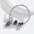 Adjustable stainless steel bangle with owl, heart pendants and blue glass beads - Black