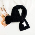 Solid black plush teddy fleece scarf with a cross-over design and white woven label - Curly Hutton (Black) / Black
