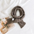 Dark brown chunky knit scarf with classic cable twist pattern and woven brand label - Coffee