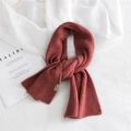 Thick knit solid brick red scarf for women with decorative stitched leather label - Rust red