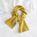 Thick bright yellow knitted scarf for women with warm ribbed texture and brand label - Yellow