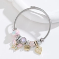 Adjustable stainless steel bangle with butterfly, crystal heart, and LOVE charms - Macaron Pink