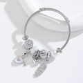 Bracciale in acciaio inossidabile argento con ciondoli a cigno e cuore su display - Bianco