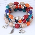 Boho-Armband mit mehrschichtigen Perlen und Anhängern wie Elefant, Herz und Flügel - Mehrfarbiger Lagenstil (090615114)