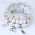 Bohemian style 3-piece stretch bracelet set with elephant, heart, and wing charms - White