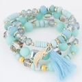 Handmade bohemian multilayer beaded bracelet set with blue tassels and gold feather charms - Light Blue