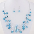 Bohemian multi-layer turquoise shell necklace and earring jewelry set on model - Blue