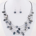 Bohemian multi-layer necklace and earring set with grey shells and metallic beads - Black