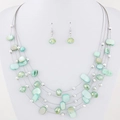 Bohemian multi-layer necklace and earrings set with green shell slices and faceted beads - Green