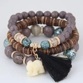 Böhmisches mehrlagiges Perlenarmband-Set mit lila Steinperlen und kleinem Elefantenanhänger - Schwarz