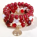 Bracelet bohème multicouche avec perles rouges et pendentif doré en forme d'arbre de vie - Rouge