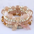 Bracelet bohème multicouche avec pendentif Main de Fatma et pompon en plumes roses - Plume Rose Pâle (090827100)