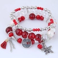 Pulsera bohemia de varias capas con borlas rojas, dije de estrella de mar y perlas - Rojo