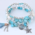 Pulsera bohemia de capas con colgante de estrella de mar, dije Love y borla azulada - Azul