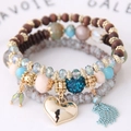 Bohemian multi-layer beaded bracelet with crystal heart pendant and blue fringe tassel - Light Blue