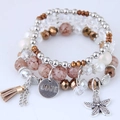 Bracelet multicouche bohème avec perles, breloque étoile de mer et gravure LOVE - Café