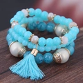 Multi-layer beaded stretch bracelet set with blue beads and a decorative tassel pendant - Lake Blue