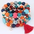 Set bracciale multistrato bohémien con perline colorate e ciondolo a nappa rosso - Colorato