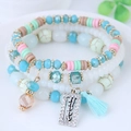 Bohemian multi-layer beaded bracelet set with turquoise accents and blue silk tassel - Colorful