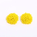 Bright yellow Bohemian handmade seed bead cluster stud earrings on plain white background - Yellow