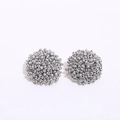 Detailed view of silver handmade beaded cluster earrings featuring textured metallic beads - Silver