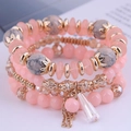 Pink bohemian layered beaded bracelets with gold tassels and crystal charms for women - Flesh Pink