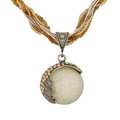 Bohemian vintage ethnic necklace featuring cream stone pendant with bronze wings - Off-white