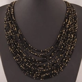 Collier bohème multicouche avec perles de rocaille noires et dorées style ethnique - Noir