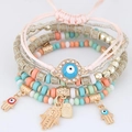 Boho-Mehrlagiges Armbandset mit bösem Blick, Hamsa-Anhängern und bunten Glasperlen - Hell Bunt
