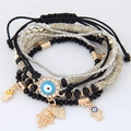 Bracciale multistrato in stile bohémien con perline, malocchio e ciondoli Mano di Fatima - Nero