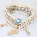 Set di bracciali bohémien multistrato con malocchio e mano di Fatima da donna - Bianco