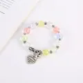 Bohemian multicolored beaded bracelet with silver heart pendant and bell charm - Colorful