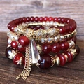 Bohemian multi-layer handmade beaded bracelet set with red agate beads and gold tassels - Red
