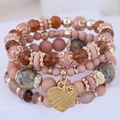 Bohemian multi-layer beaded bracelet set with golden heart pendant and tassel details - Coffee