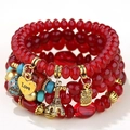Bracciale bohémien multistrato di perline rosse con ciondoli a cuore Love, torre e gufo - Rosso