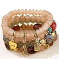 Multilayer beaded bracelet with gold Love heart, Eiffel Tower, and owl charms - Coffee