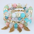 Bracelet bohème multicouche avec perles colorées, cristaux et pampilles feuilles dorées - Coloré