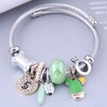 Silver adjustable steel wire bracelet with crystal number 5 and cactus charms - Green
