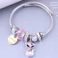 Adjustable stainless steel wire bracelet with pink crystal beads and cat charm - Pink