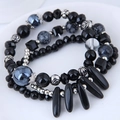 Vintage multi-layer beaded bracelet with black cat-eye hearts and silver rose charms - Black