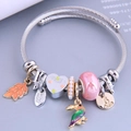 Pulsera vintage de hilo de acero inoxidable con dijes de tucán y hoja - Rosa
