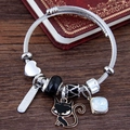 Adjustable stainless steel charm bracelet with heart, cat charms, and beads - Black