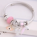 Bracciale in acciaio con ciondoli a forma di gufo e occhio greco rosa su carta - Rosa