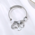 Silver stainless steel charm bracelet featuring bunny, heart, and crescent moon pendants - White