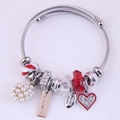 Western style silver wire charm bracelet with red heart pendant and faux pearls - Red
