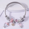 Silbernes Perlenarmband mit rosa Heißluftballon, Kronen-Hase und Glasperlen - Rosa